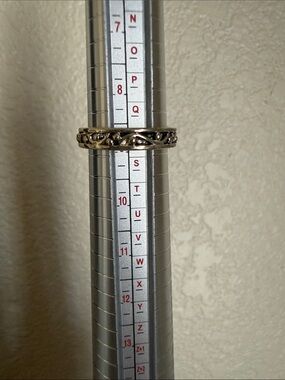 Intricate Twisted Band Ring in Metallic Silver